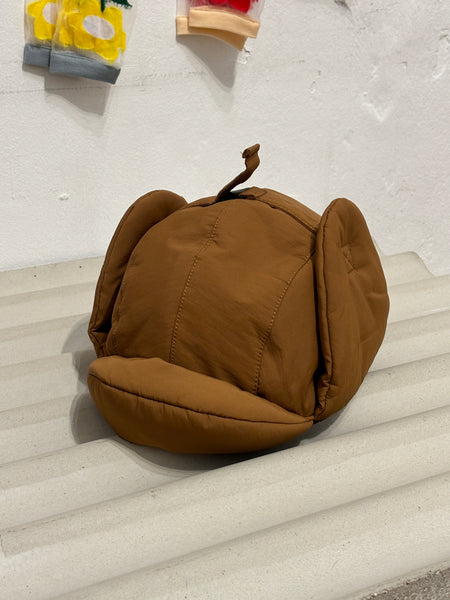 Padding cap