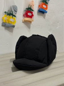 Padding cap