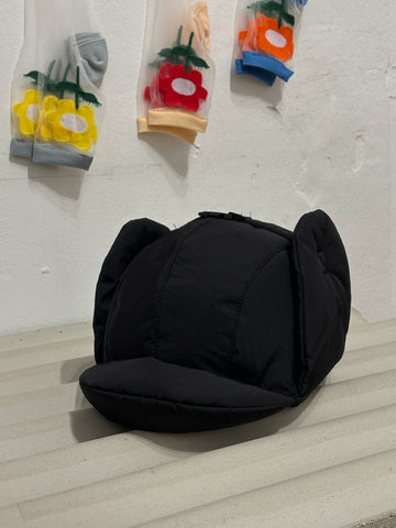 Padding cap