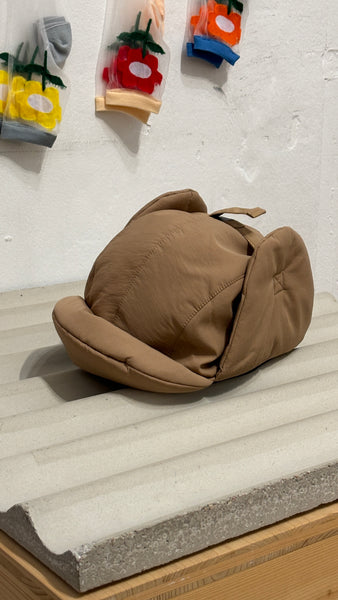 Padding cap