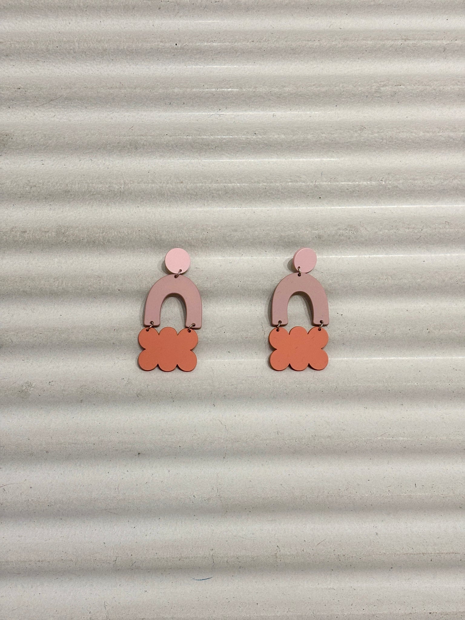 Cloud and arc shaped earrings