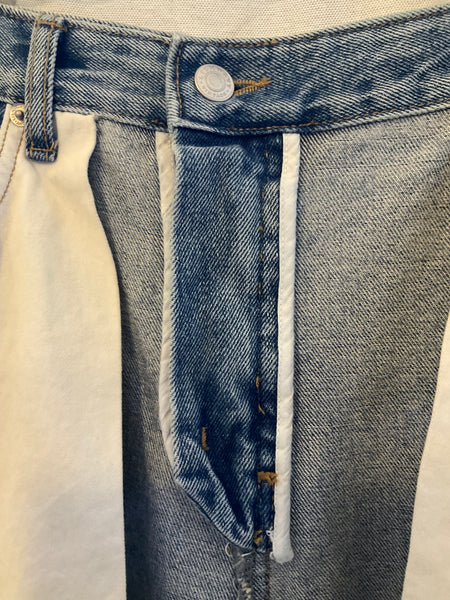 Inside-out blue denim trousers